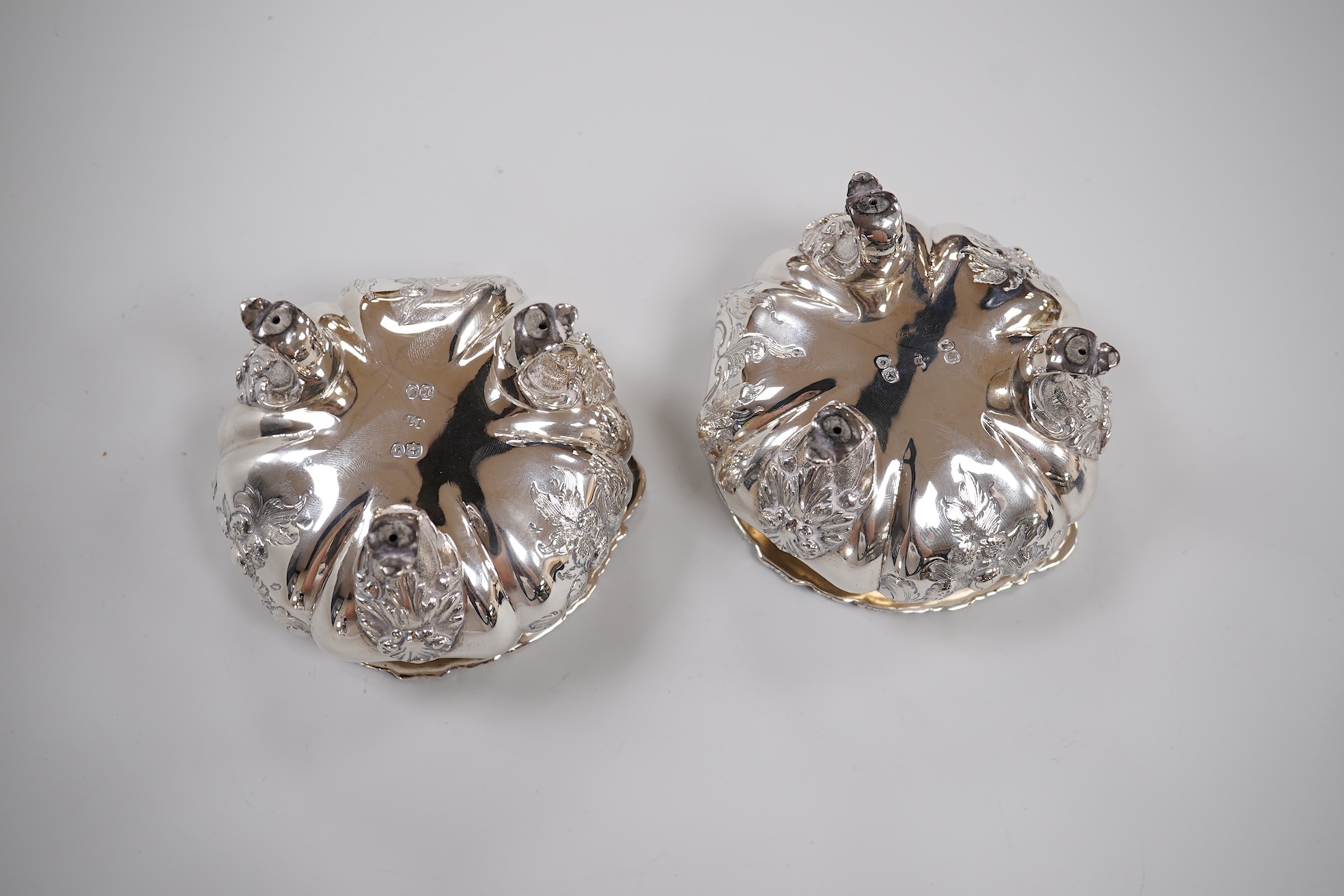 A pair of early Victorian silver cauldron salts, by John Tapley, London, 1838, with later blue glass liners, diameter 94mm, together with a pair of George IV silver Old English pattern condiment spoons, London, 1828.
